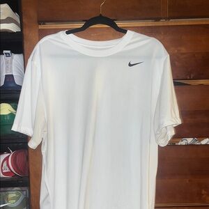 Nike White Short Sleeve Dri-FIT Tee with Black Swoosh